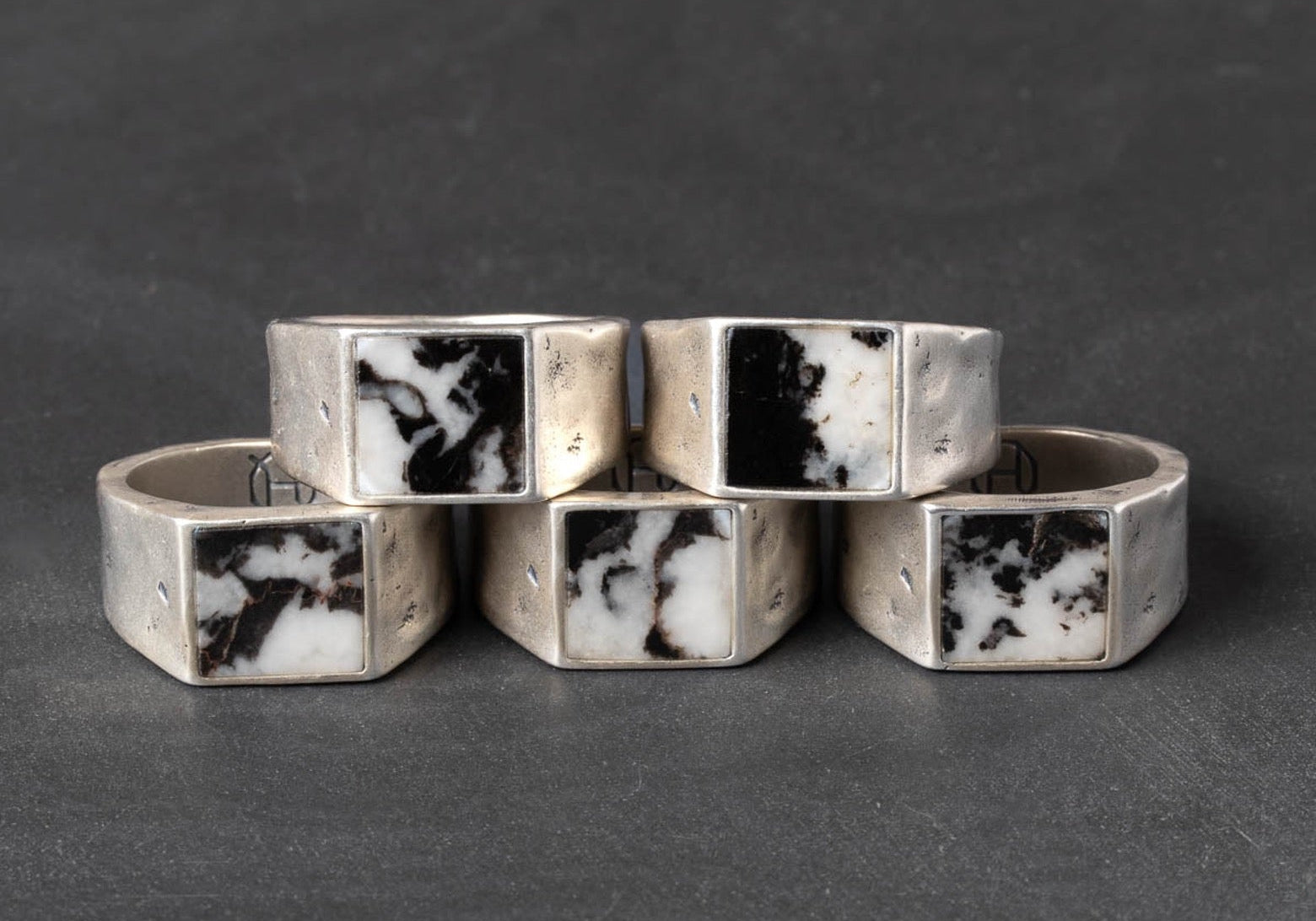 Five rings made of rugged silver and zebra jasper 