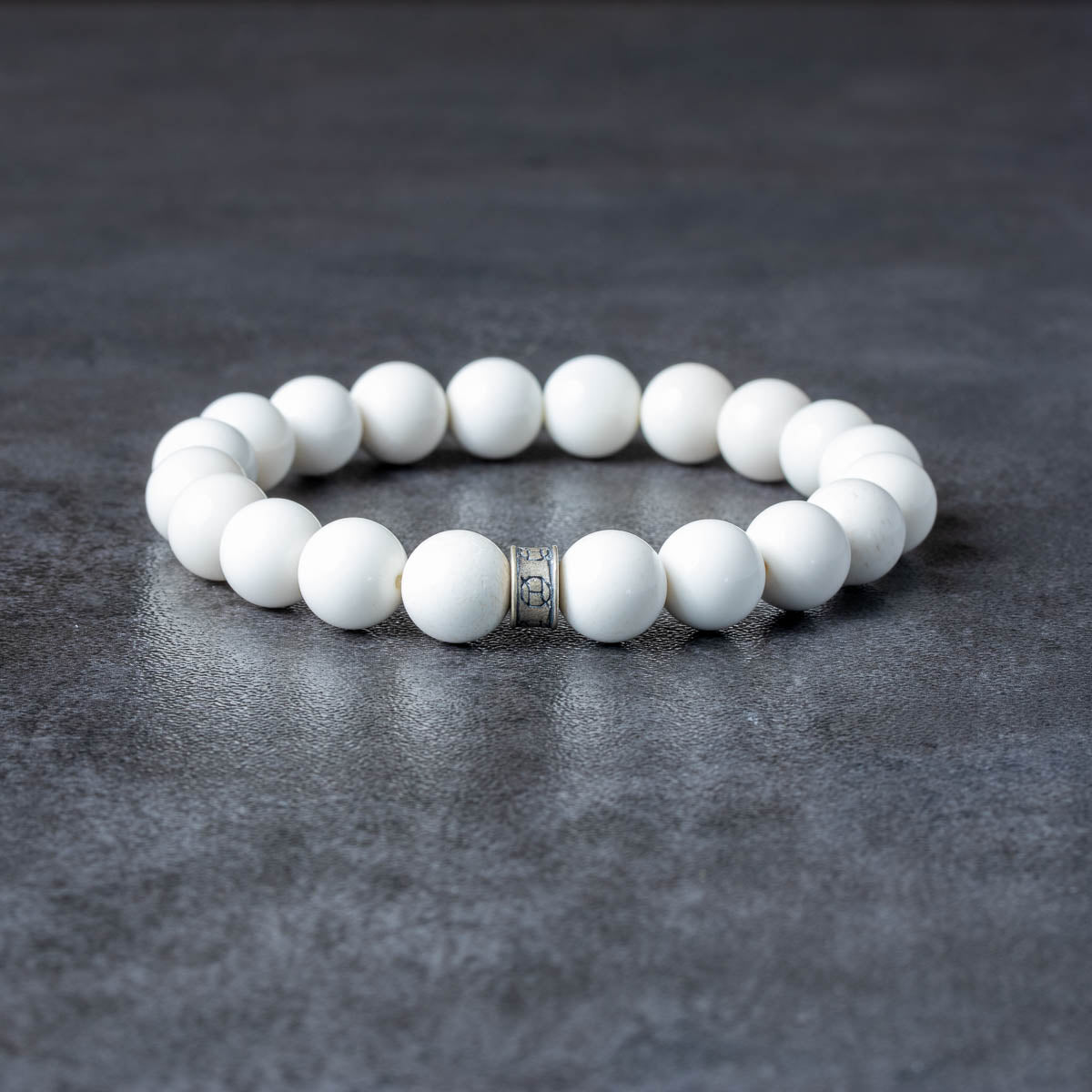 White Onyx Beaded Bracelet with silver logo bead
