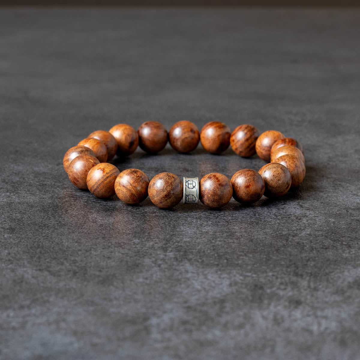 Wood beaded bracelet with silver accent