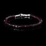 Beaded bracelet with dark red garnet beads