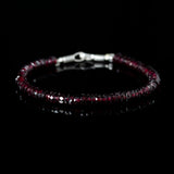 Beaded bracelet with dark red garnet beads