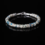 White and blue beaded bracelet with silver clasp