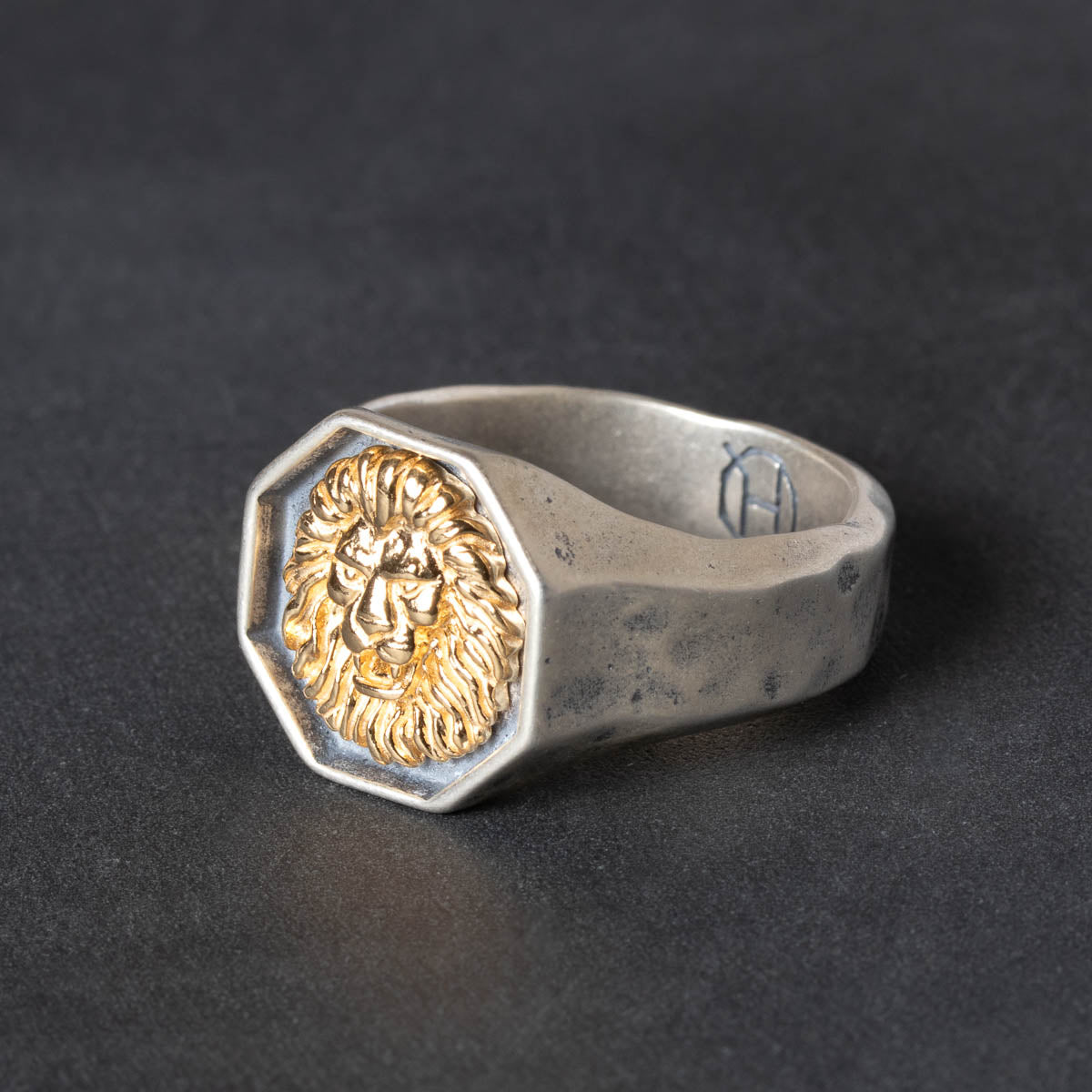 Octogon shaped Silver ring with gold lion emblem 