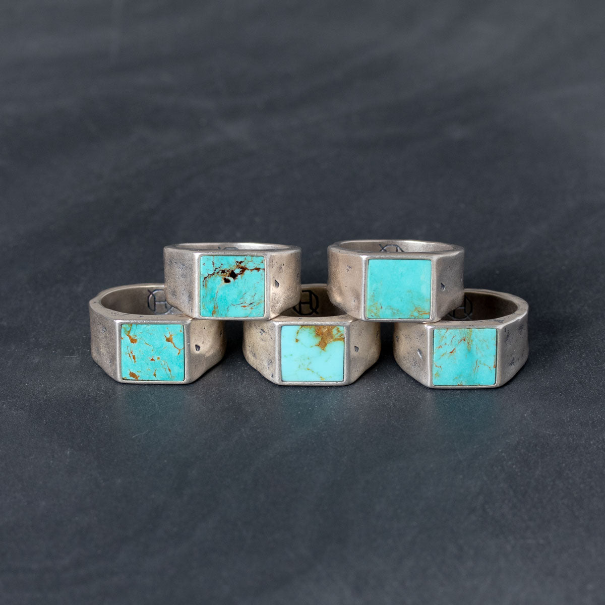 Five silver signet rings with turquoise inlay