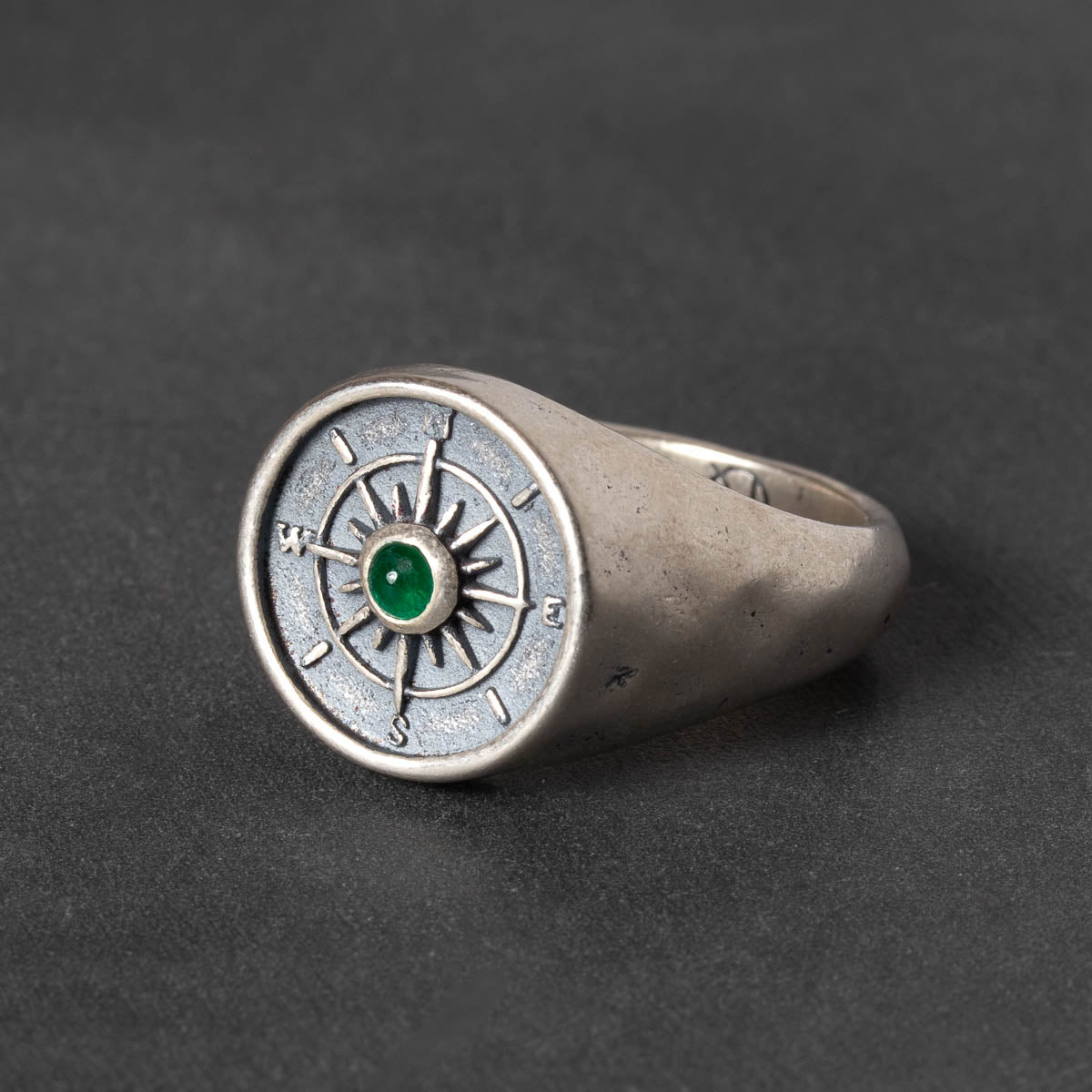 round Silver signet ring with compass design and green emerald cabochon 