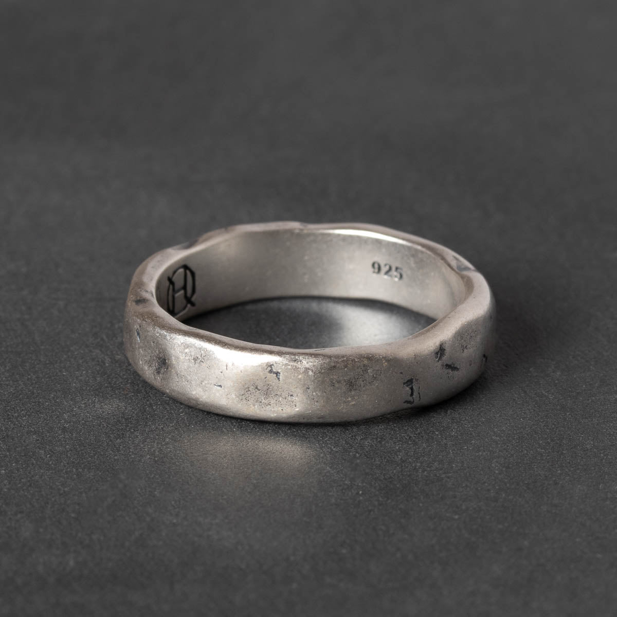Silver ring with rugged textured finish 