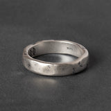 Silver ring with rugged textured finish 