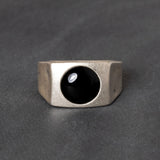 Sterling silver ring with black onyx cabochon center stone