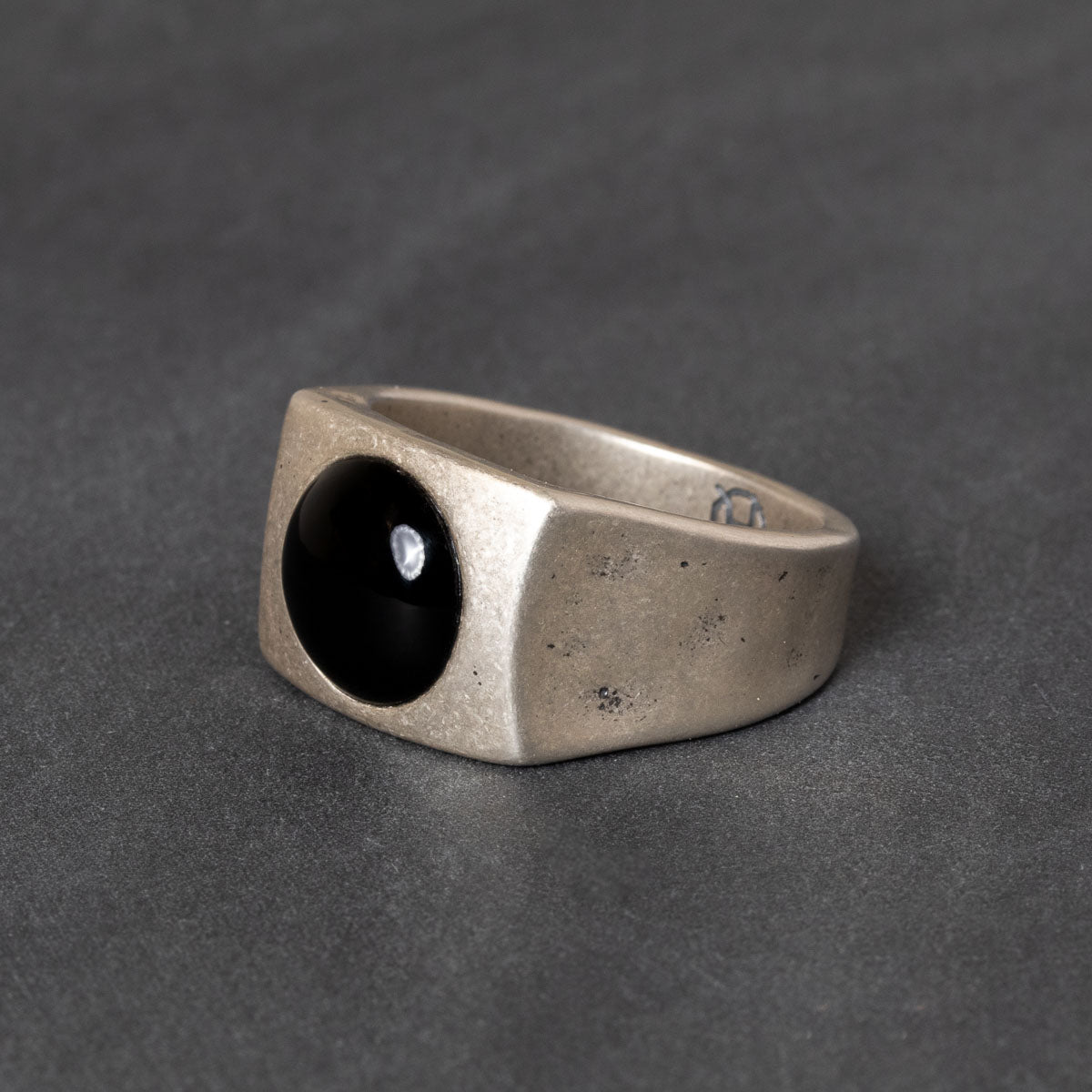 Quinn Henry silver ring with black onyx cabochon center stone 