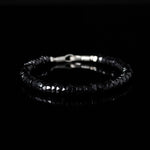 Beaded bracelet with black spinel beads and silver clasp