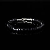 Beaded bracelet with black spinel beads and silver clasp