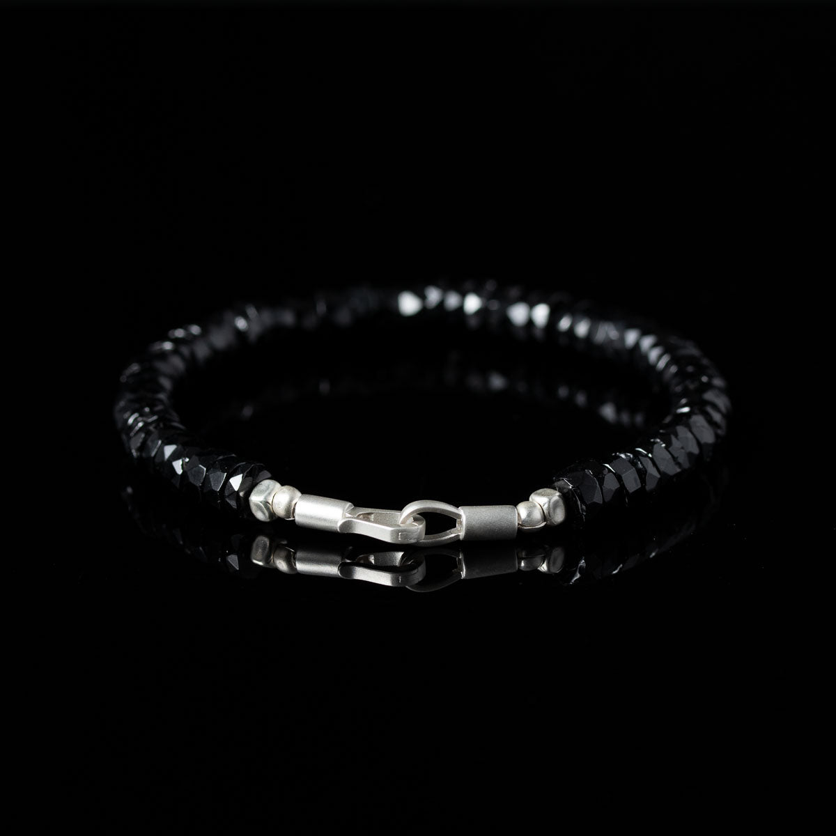 Bracelet with black spinel beads and silver clasp